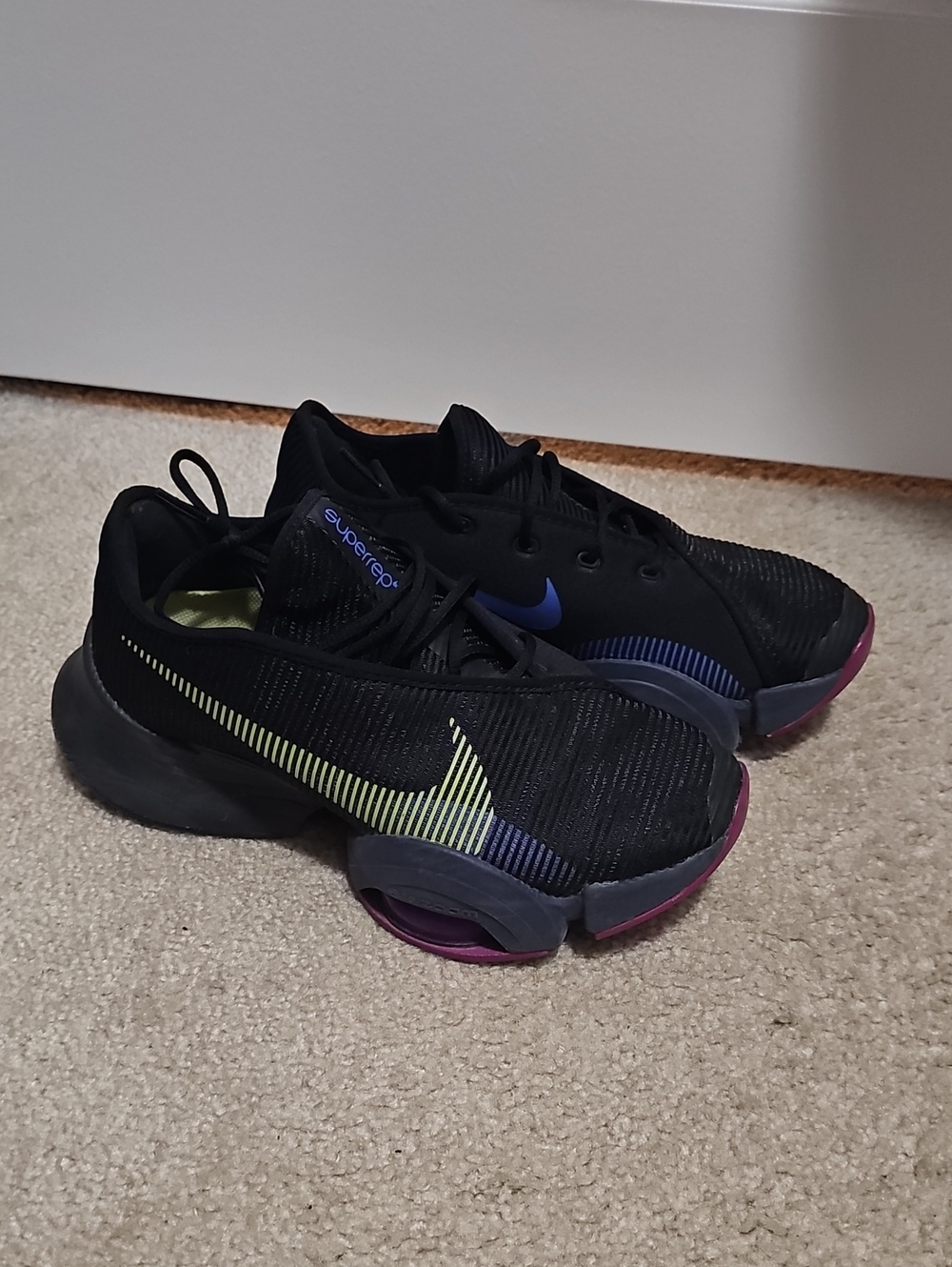 Nike Womens Black Sneakers with Purple and Neon Yellow Accents